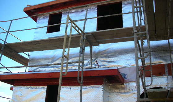 MVW General Contractors Inc. — Low-E Install — Scaffolded Second Story